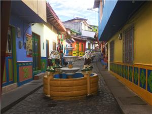Cobblestone streets and decorated facades in Guatape