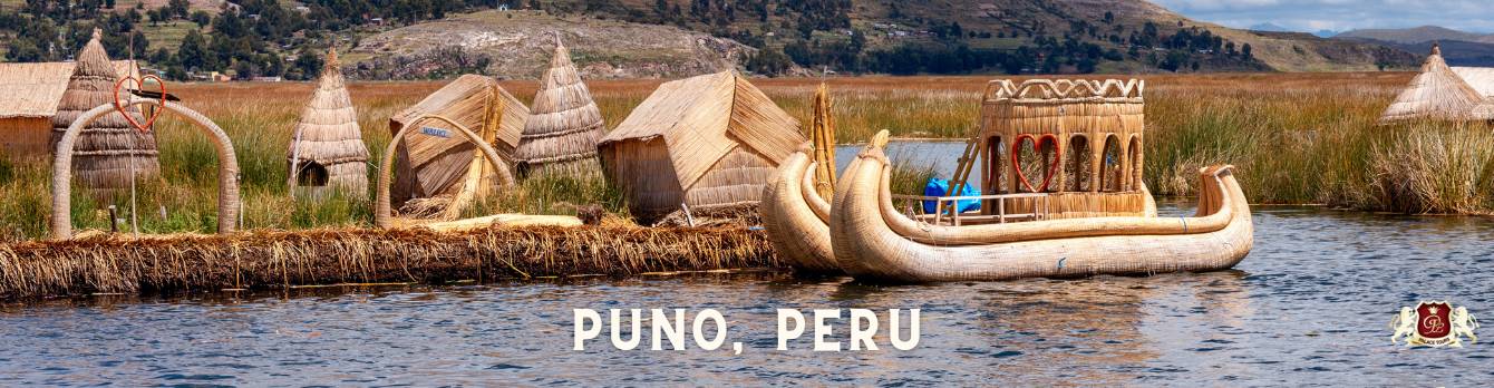 Uros floating islands on Lake Titicaca, Peru. Reed boats and houses visible on the man-made islands. Best of Peru tour.