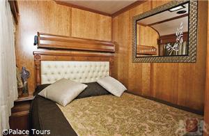 Luxury suite with double bed on board the train