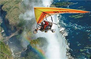 Micro-light flying over Victoria Falls